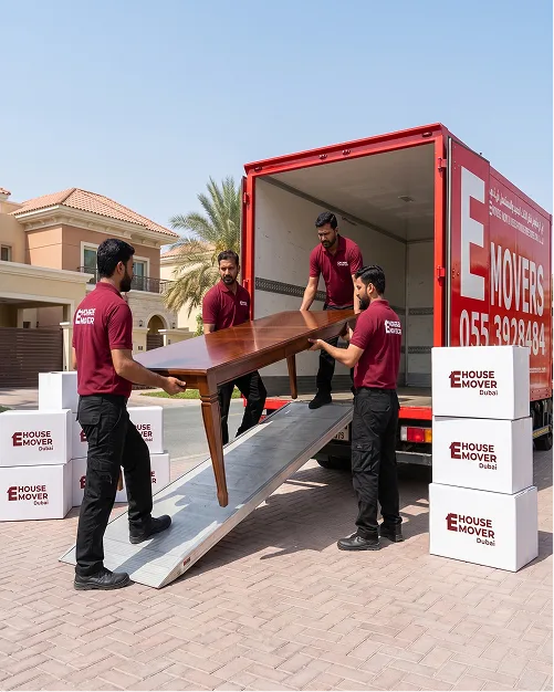 E House Mover Team Loading Furniture for Safe Moving