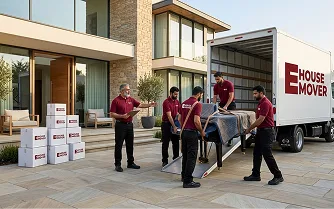 E House Mover Team Loading Furniture for Safe Relocation