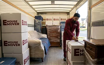 E House Mover Team Planning Moving Process with Professional Team