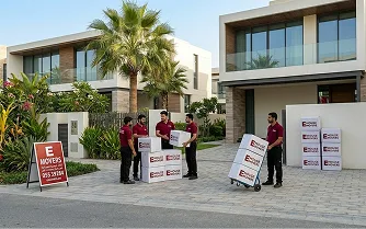 E House Mover Team Preparing Boxes for Villa Relocation