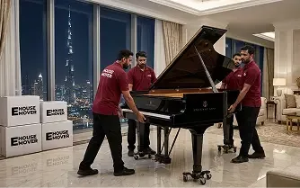 Professional movers relocating a grand piano inside a luxury Dubai home.