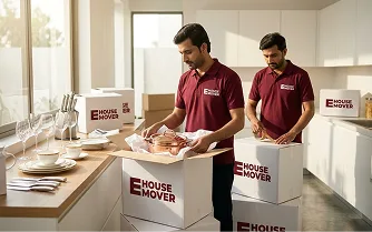 E House Mover UAE team packing boxes for apartment move