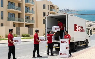 Movers and Packers in dubai loading boxes