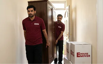 E House Mover Team Moving Furniture Inside Apartment 3