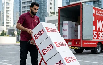 E House Mover Team Preparing Boxes for Villa Relocation 